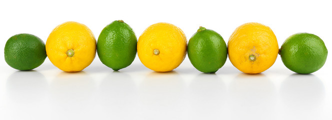 Lemons and limes, isolated on white
