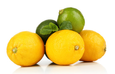 Lemons and limes, isolated on white