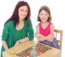 Fototapeta premium Mom and daughter at the table.