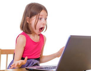  girl sitting at a laptop.