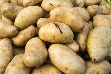 raw potatoes, food background