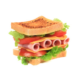 Sandwich with bacon and vegetables.