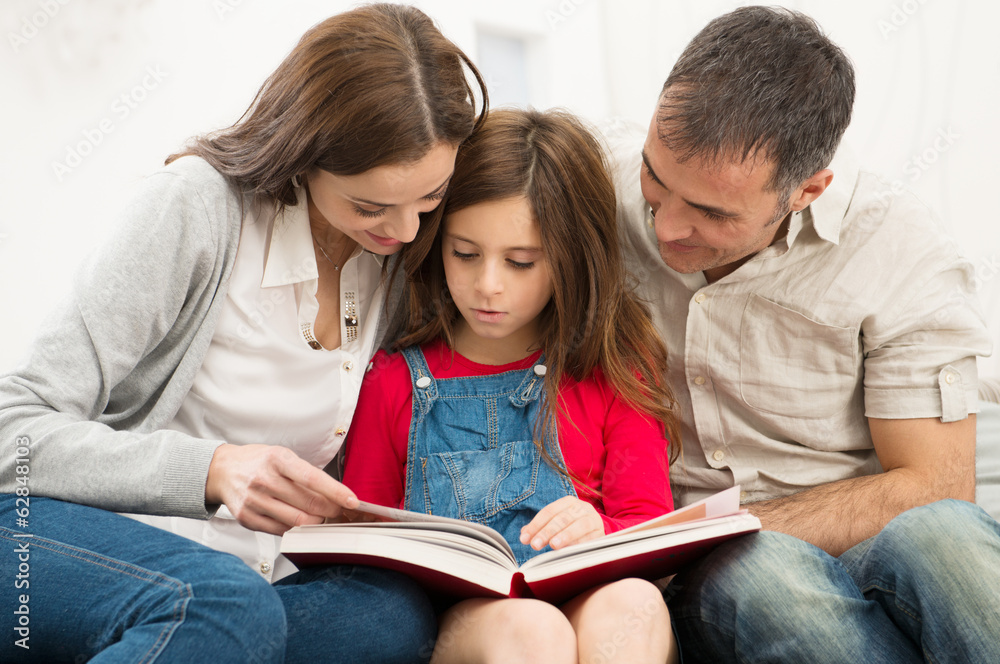 Wall mural parents helping daughter in studies