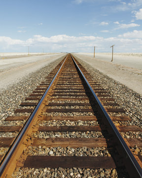 A railroad extending through the desert, near Wendover in Utah.