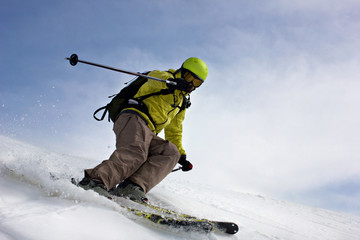 skier on mountain slopes