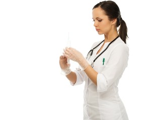 Young positive brunette doctor woman with syringe 