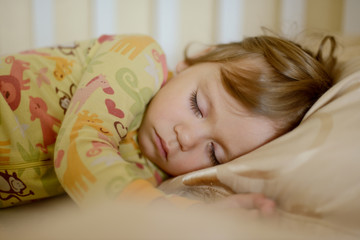 Obraz premium sleeping toddler girl