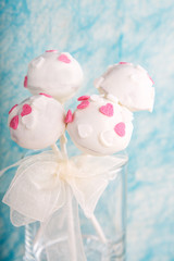 Wedding cake pops in white and soft blue.
