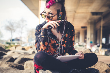 young beautiful punk dark girl using tablet - obrazy, fototapety, plakaty