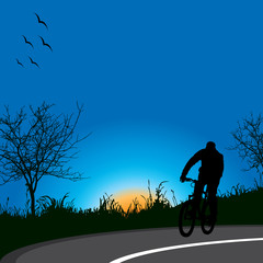 Obraz na płótnie Canvas Driving bicycle in nature