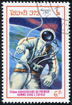 stamp printed in Laos shows astronaut