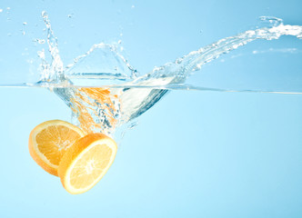 fruits splashed into water