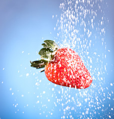 red strawberry sprinkled with white sugar