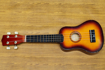 ukulele on wood texture