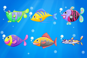 Obraz na płótnie Canvas An ocean with colorful fishes