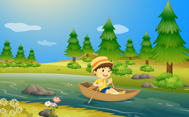 Obraz na płótnie Canvas A boy riding a boat
