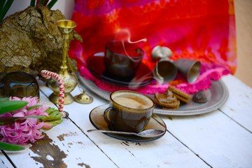 Coffee time in Eastern ethnic style and fucshia