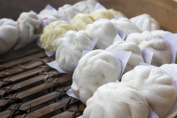 Hot steamed bun in bamboo steamer