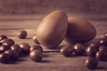 Chocolate Easter Eggs Over Wooden Background