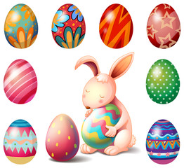 Obraz na płótnie Canvas A bunny surrounded with Easter eggs