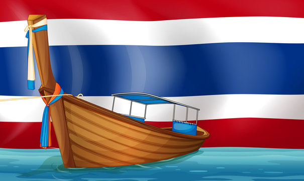 A boat in front of the Thai flag
