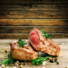 Beef steak on a wooden table