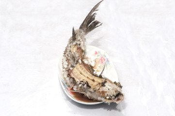 Baked Striped snakehead fish with salt coated.