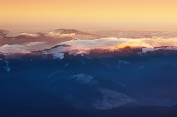 Fototapeta na wymiar Colorful sunrise in the mountains