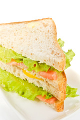 Sandwich with salmon on white background