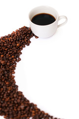 Cup of black coffee with coffee beans