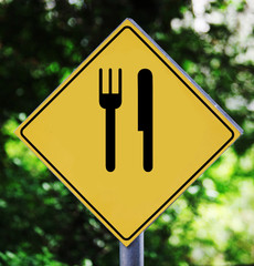 Yellow traffic label with restaurant pictogram
