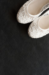 Beautiful white lace bridal shoes © tunderfold