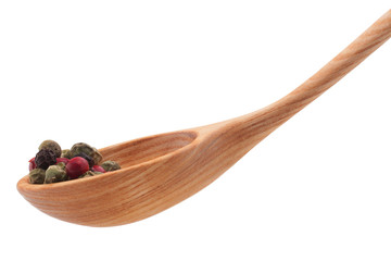 Pepper seasoning  mix in wooden spoon isolated on white backgrou