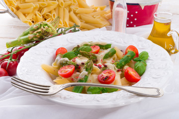 Noodles with asparagus in cream-cheese sauce