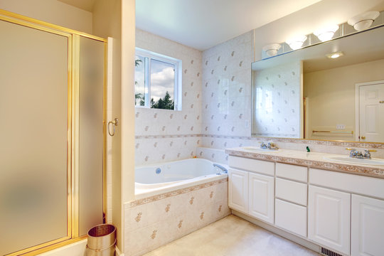 Bathroom interior with tile wall trim