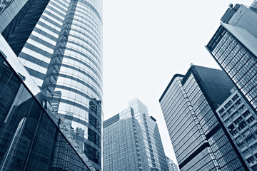 Obraz na płótnie Canvas Modern glass silhouettes of skyscrapers in the city
