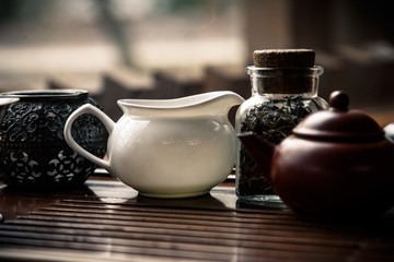 A special board with a teapot and a saucer