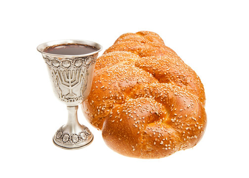 Challah and Silver Kiddush cup for Jewish Sabbath