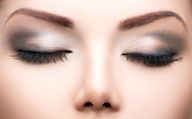 Beauty eyes makeup closeup. Long eyelashes, perfect skin