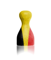 Wooden pawn with a painting of a flag