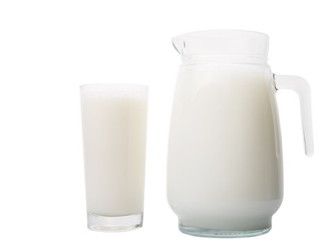 A jug and a glass of fresh daily milk