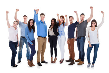 Group of diverse people raising arms