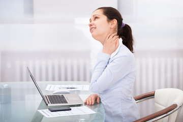 Businesswoman Having Neckache