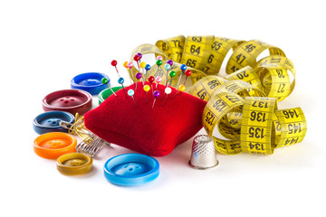 Tools for sewing: measurement, button, thimble, pins