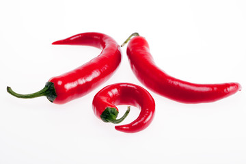 red peperoni peppers isolated on white background