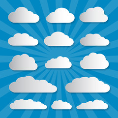 Vector Clouds Cut From Paper on Blue Background