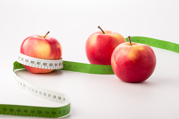Apples with measure tape