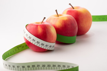 Apples with measure tape