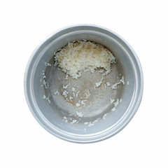 Rice in rice cooker pot isolated on white background
