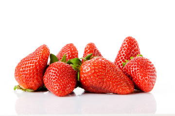 Ripe red strawberries on white background isolated